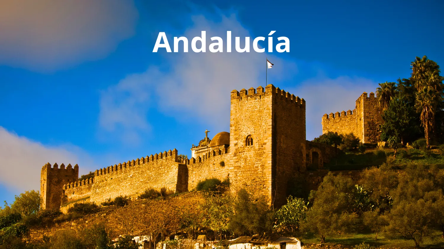 Foto de un castillo andaluz con el texto sobreimpreso: Castillos de Andalucía.