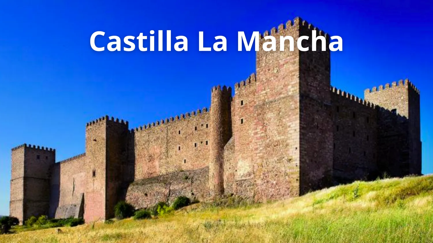 Foto de un castillo con el texto sobre escrito: Castilla La Mancha.