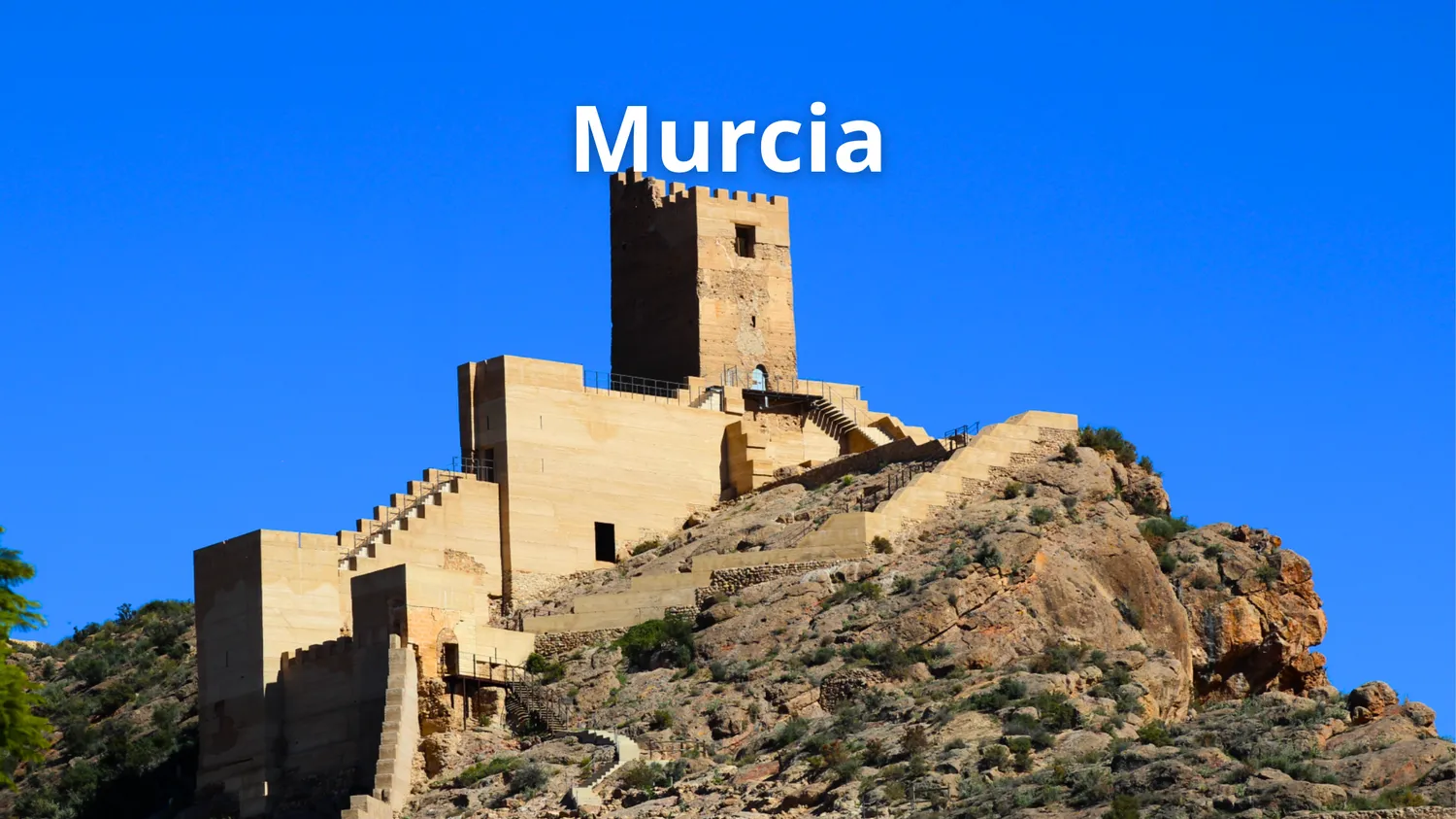 Foto de un castillo murciano con el texto sobreimpreso: Murcia.